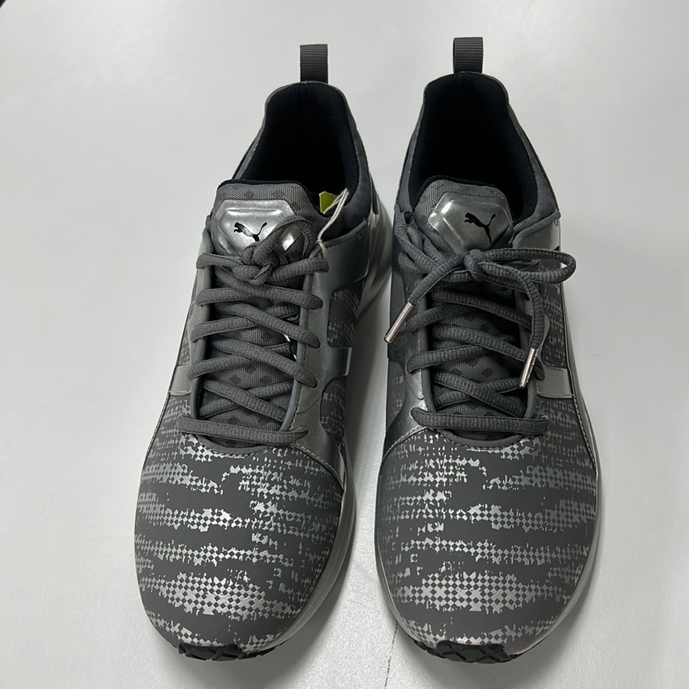 Silver and gray colored sneaker. Classified for lifestyle, not running.